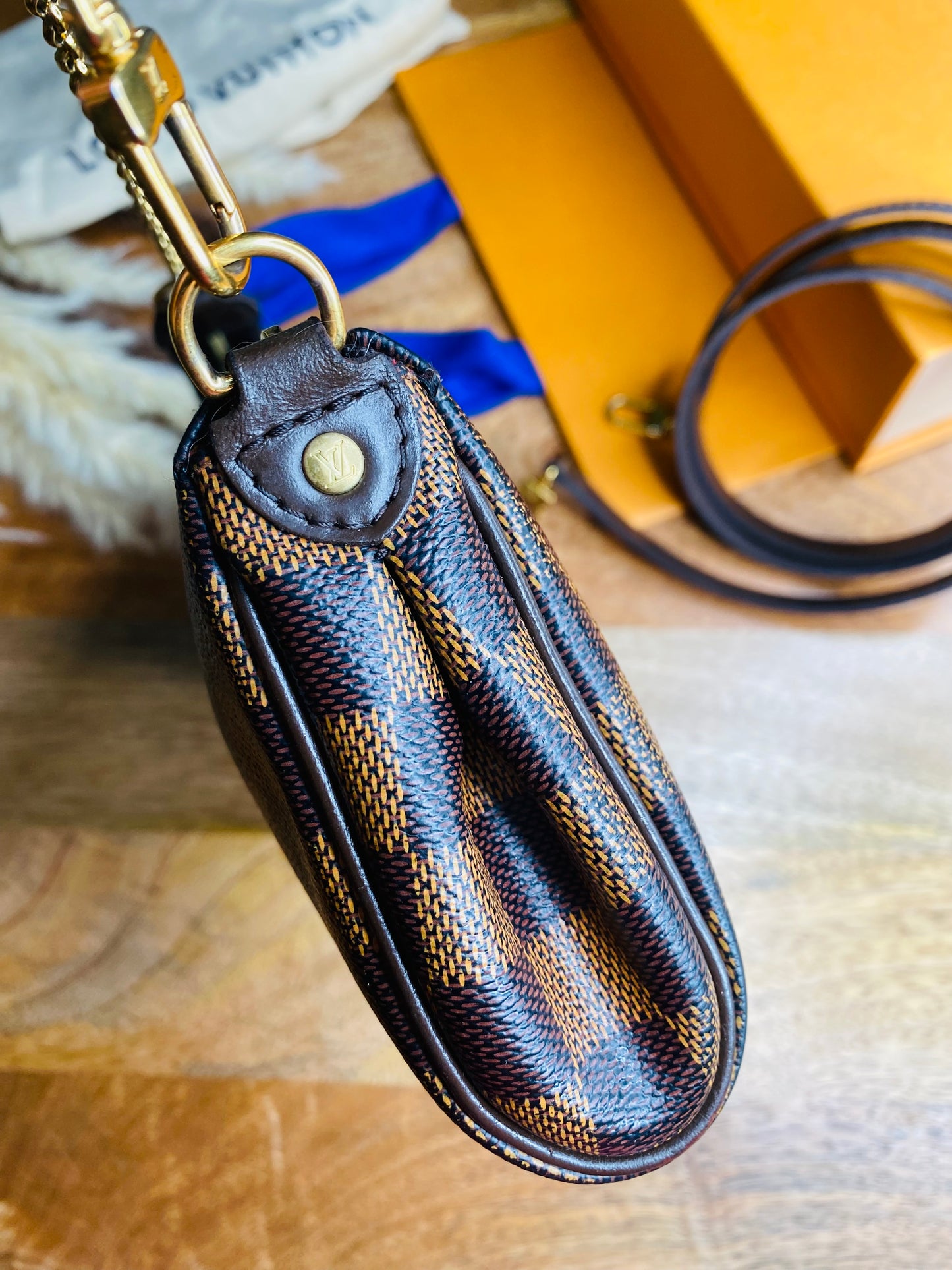 EVA CLUTCH SLING