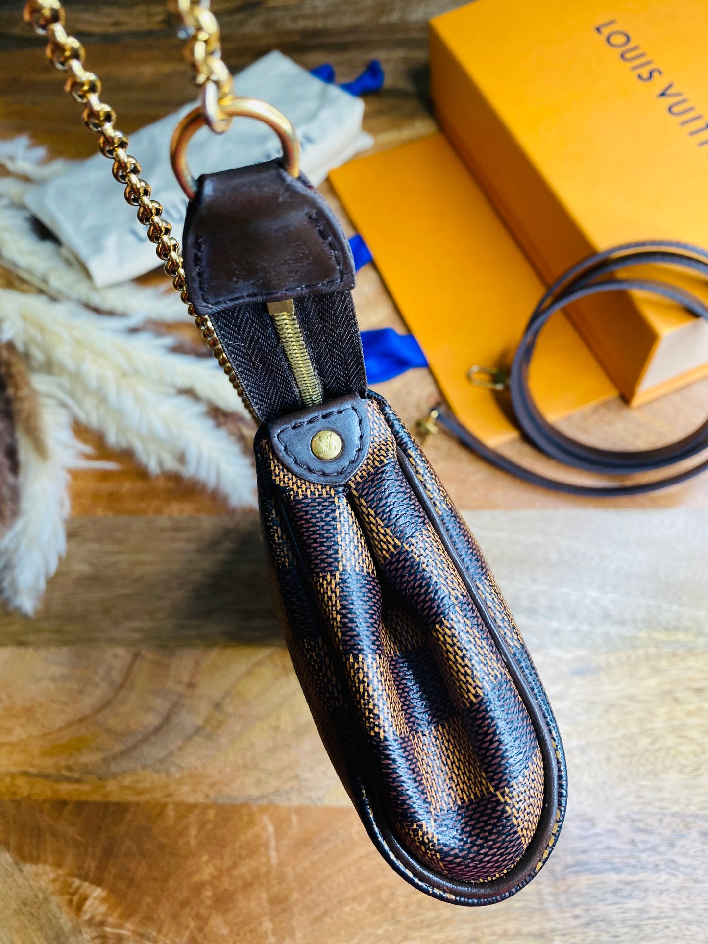 EVA CLUTCH SLING