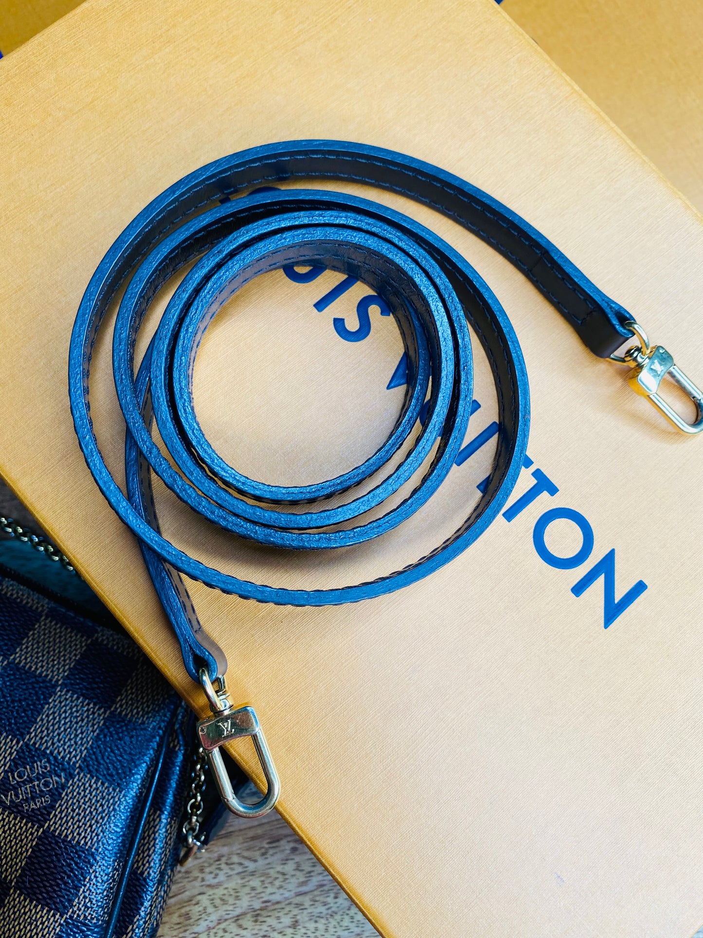 EVA CLUTCH SLING