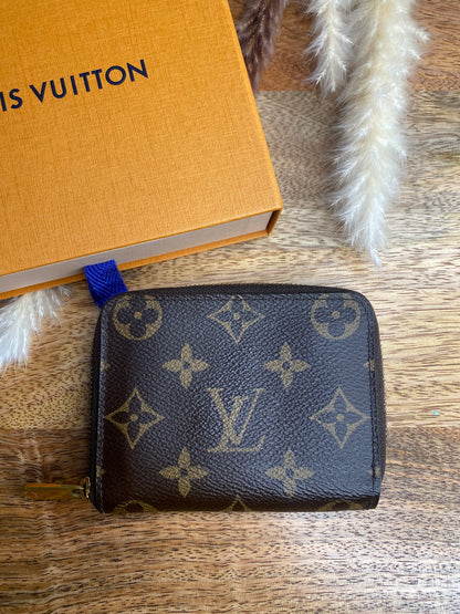 LOUIS VUITTON SHORT ZIPPY WALLET (microchip)