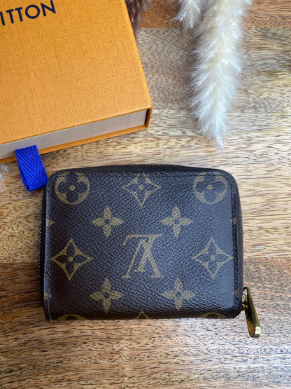 LOUIS VUITTON SHORT ZIPPY WALLET (microchip)