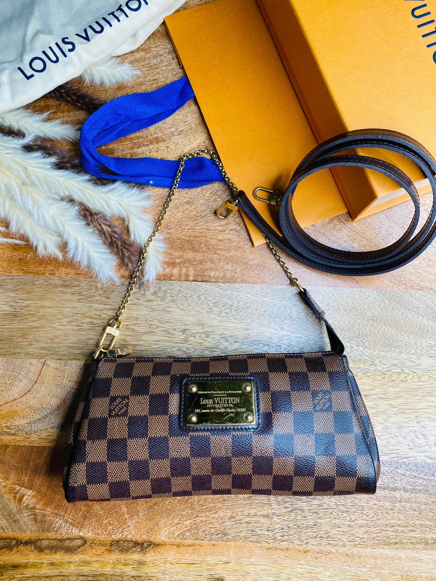 LOUIS VUITTON EVA CLUTCH SLING