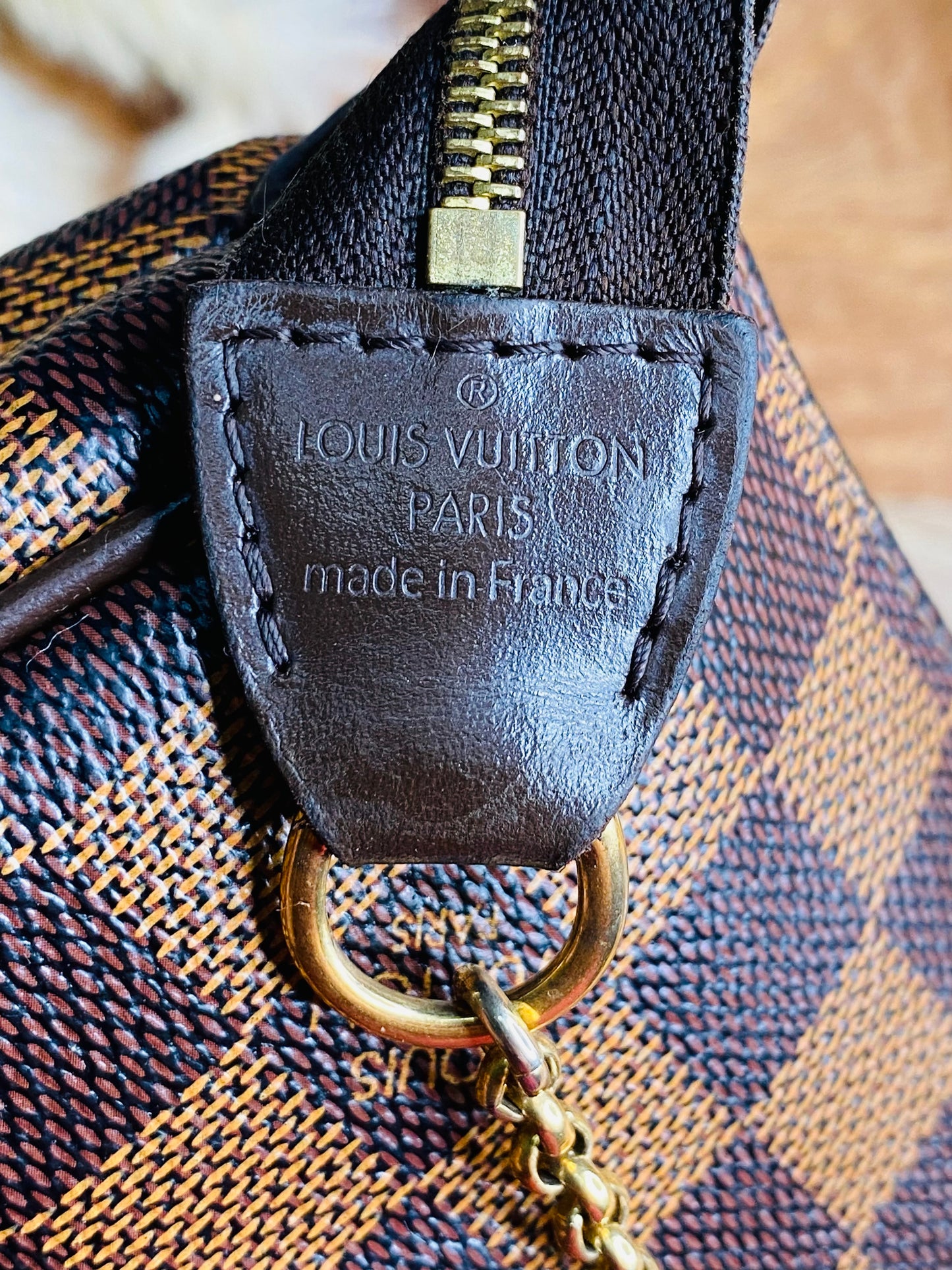 LOUIS VUITTON EVA CLUTCH SLING